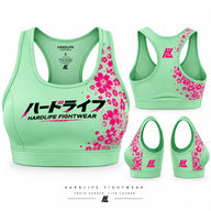 Green Sakura Sports Bra with pink floral print, front and back views