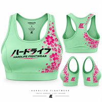 Green Sakura Sports Bra with pink floral print, front and back views