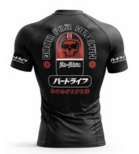 Black bjj rash guard with graphic design and text on a white background